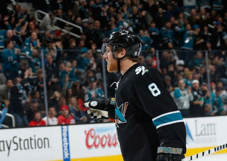 SAN JOSE, CA - JANUARY 9: Joe Pavelski #8 of the San Jose Sharks celebrates his goal against the Detroit Red Wings during an NHL game on January 9, 2014 at SAP Center in San Jose, California. (Photo by Don Smith/NHLI via Getty Images)