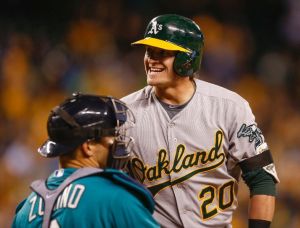 SEATTLE, WA - APRIL 11: Josh Donaldson #20 of the Oakland Athletics reacts after being called out on strikes with the bases loaded in the eighth inning against the Seattle Mariners at Safeco Field on April 11, 2014 in Seattle, Washington. (Photo by Otto Greule Jr/Getty Images)