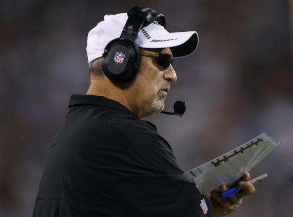 New York Jets offensive coordinator Tony Sparano looks on against the New York Giants during the second quarter of their pre-season NFL football game in East Rutherford